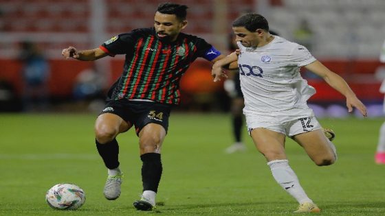 Mohamed Rabie Hrimat of AS FAR challenges Ahmed Tawfik Mohamed Hassan of Pyramids during the CAF Champions League 2024/25 match between AS FAR and Pyramids at Honneur Stadium in Meknes, Morocco on 8 April 2025 ©Djaffar Ladjal/BackpagePix